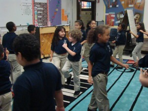 3rd grade class playing Old King Glory